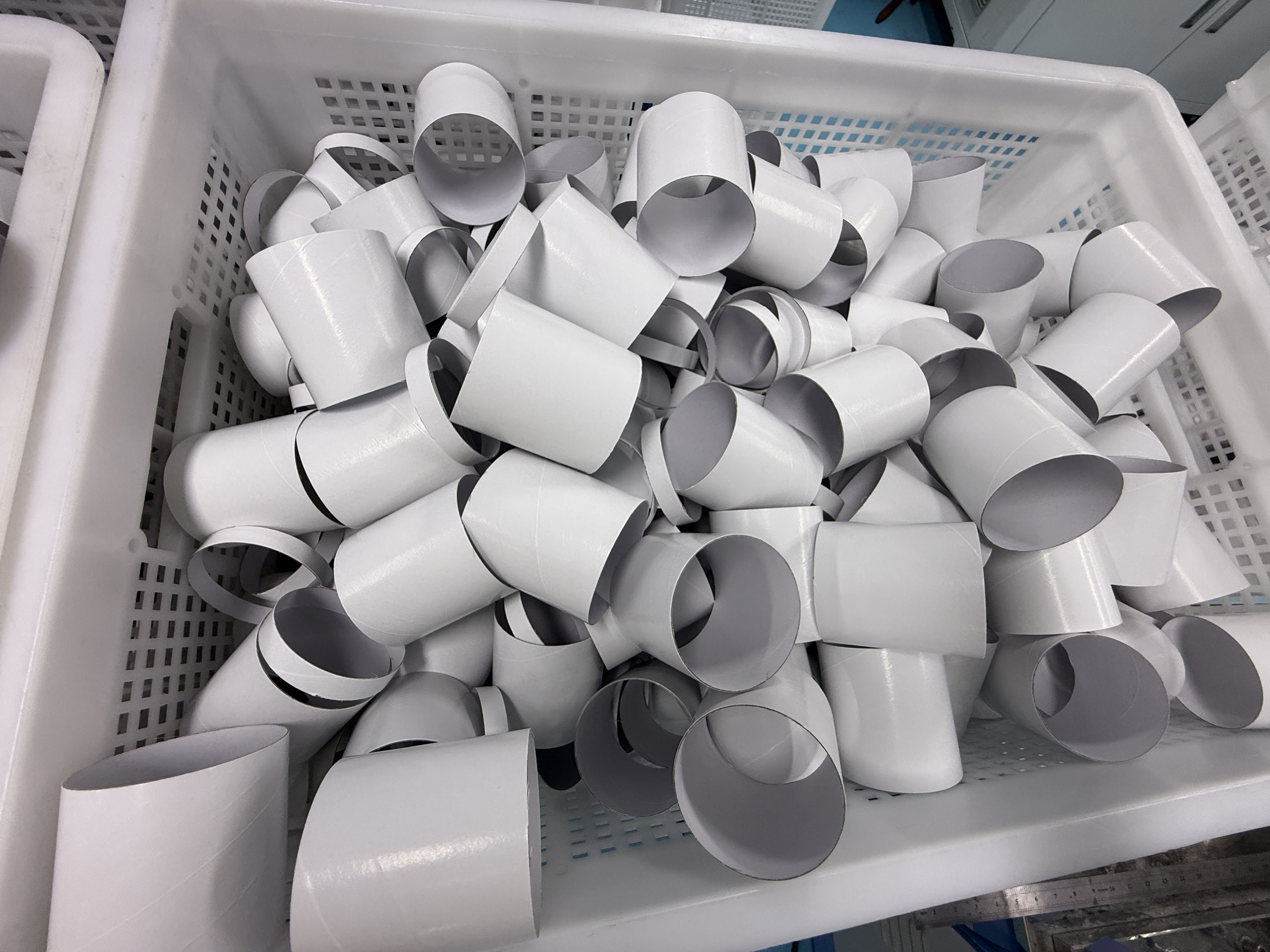 Surface preparation and coating before printing custom paper tube packaging